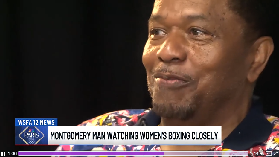 bill paul montgomery man watching womens boxing closely